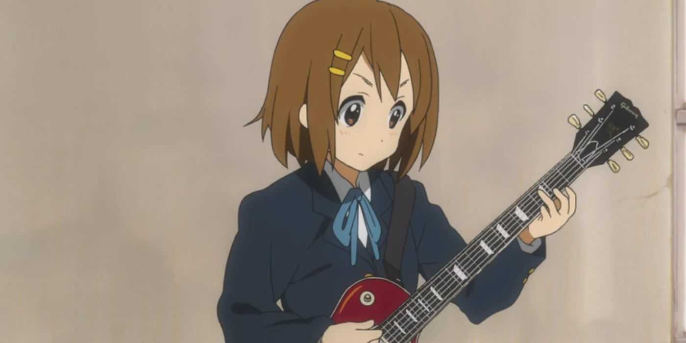 Yui Hirasawa From K-ON playing the guitar.