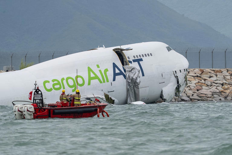 Two dead as Hong Kong cargo plane splits in half after skidding off ...