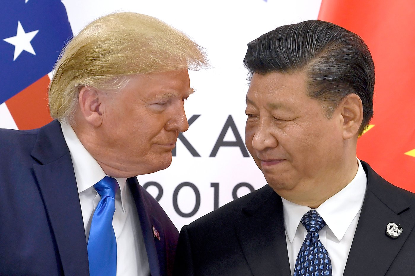 FILE - U.S. President Donald Trump, left, meets with Chinese President Xi Jinping during a meeting on the sidelines of the G-20 summit in Osaka, Japan, June 29, 2019.(AP Photo/Susan Walsh, File)