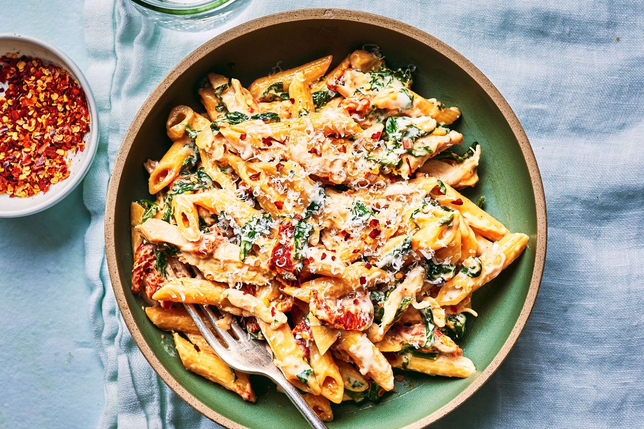 Southern Living Spinach-And-Sun-Dried Tomato Pasta on a plate to serve