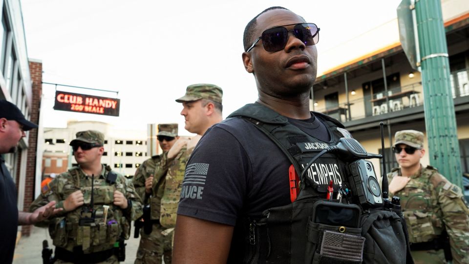 US Army National Guard members assist the Memphis Police Department in the entertainment district, Beale Street, in downtown Memphis, on October 16. - Karen Pulfer Focht/Reuters