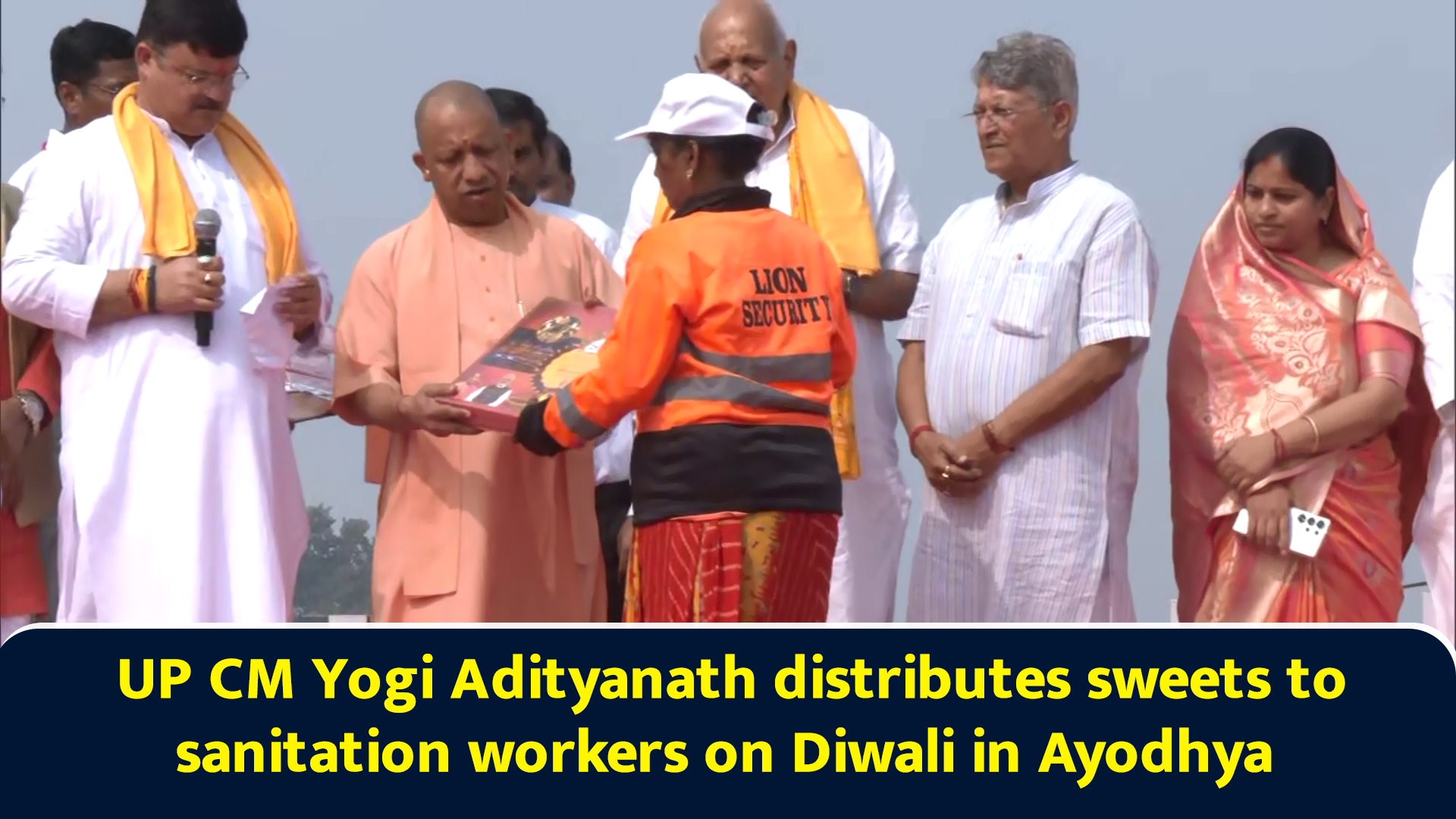 UP CM Yogi Adityanath distributes sweets to sanitation workers on ...