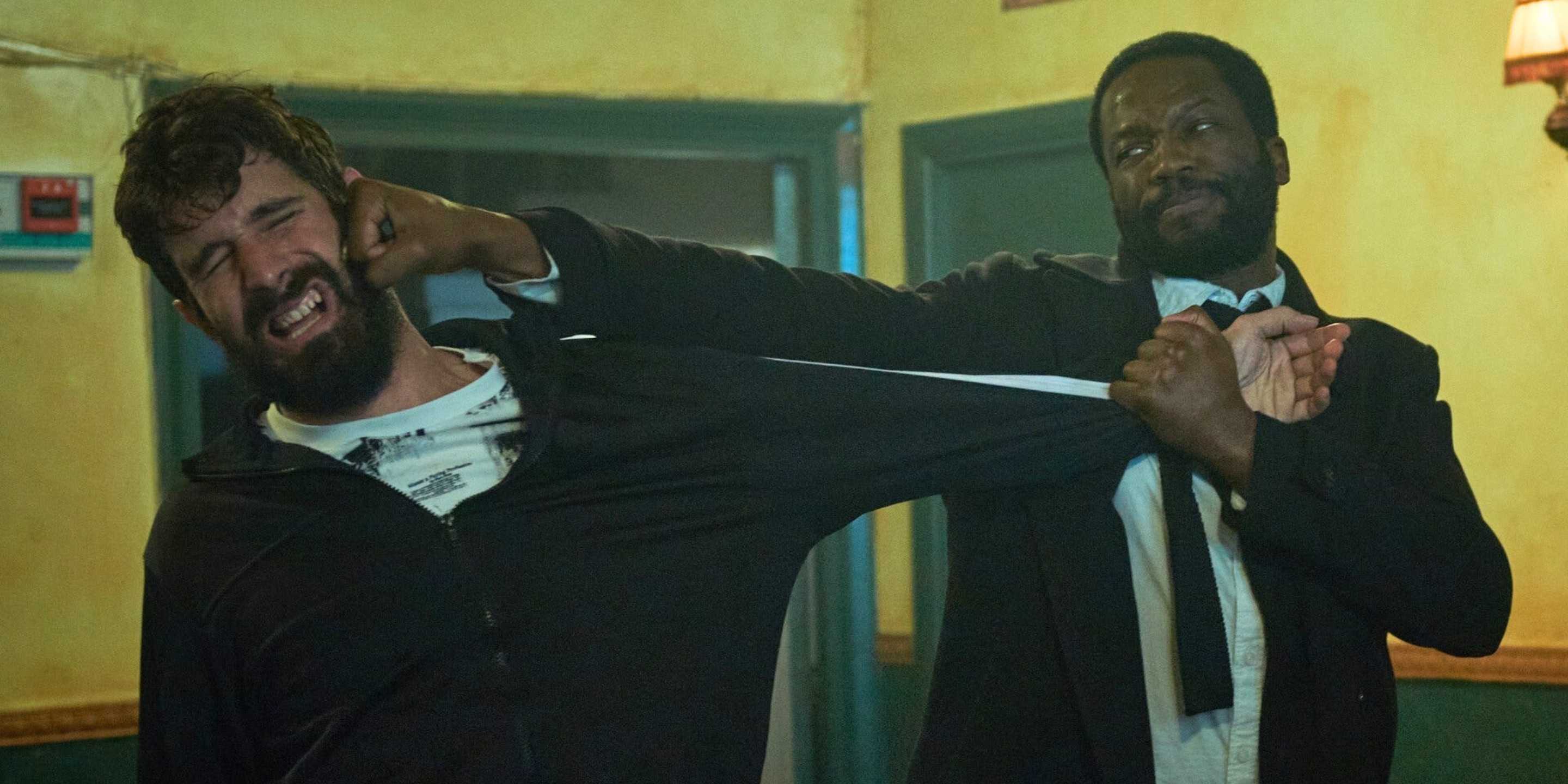 Sope Dirisu punching someone in Gangs of London