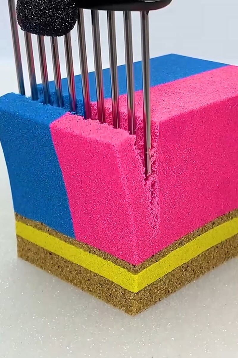 Precision-cut layered sand cube in vivid colors