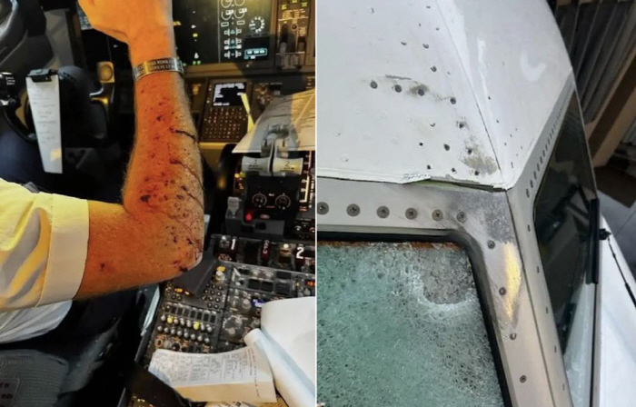 Airplane cockpit glass damaged 10km above...Collision with one in a ...