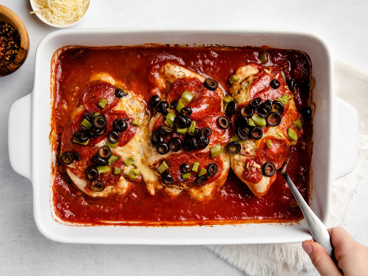 Overhead shot of a pan with pizza chicken