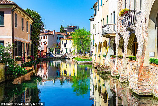 Only 45 minutes from Venice by car or train, Treviso (pictured) promises all the same beauty and quintessentially Italian features - just without the crowds