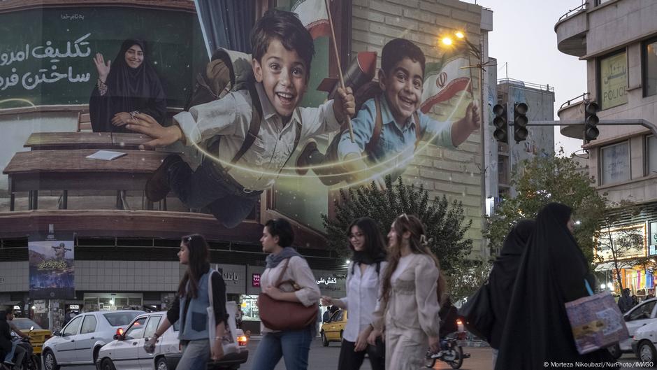 Contrary to this propaganda billboard seen in Tehran, young Iranians have bleak prospects under a repressive regime