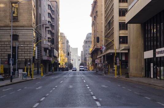 Early morning street scene in downtown Joburg, Johannesburg, Gauteng, South Africa.