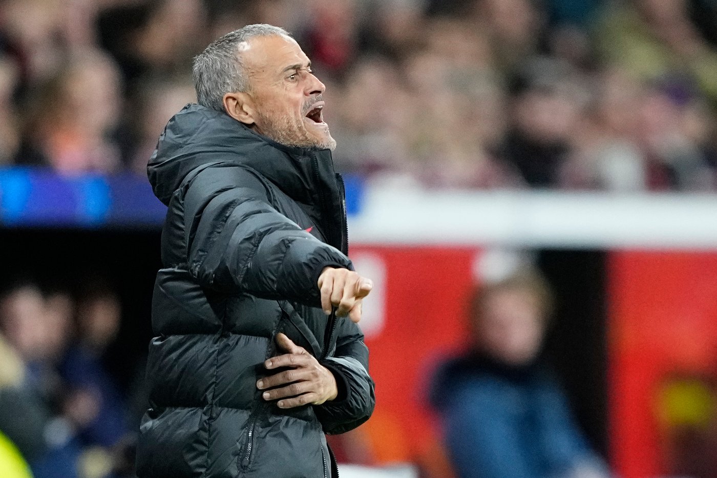 PSG's head coach Luis Enrique gestures during a Champions League opening phase soccer match between Bayer Leverkusen and Paris Saint-Germain in Leverkusen, Germany, Tuesday, Oct. 21, 2025. (AP Photo/Martin Meissner)