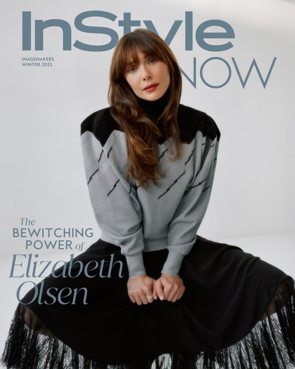InStyle magazine cover featuring Elizabeth Olsen wearing a black and gray sweater and black skirt.