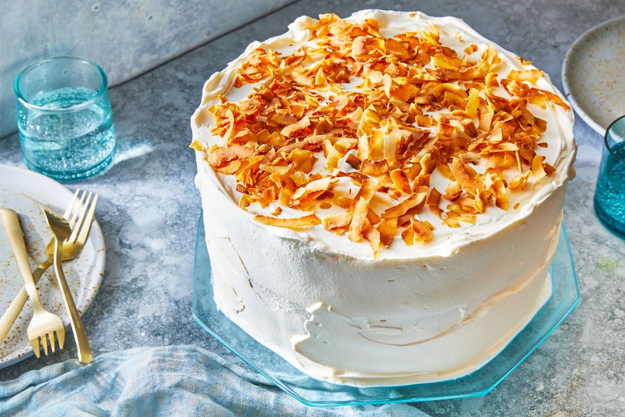 Southern Living Classic Coconut Cake fully assembled on a cake plate to serve