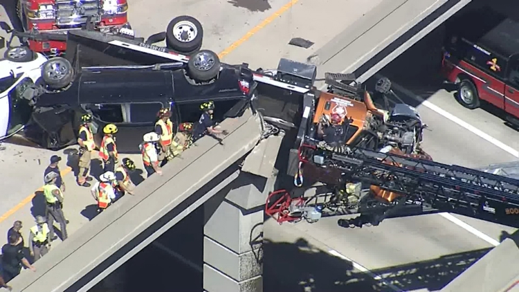 Live coverage: Truck hanging off overpass at U.S. 75 & Hwy 121