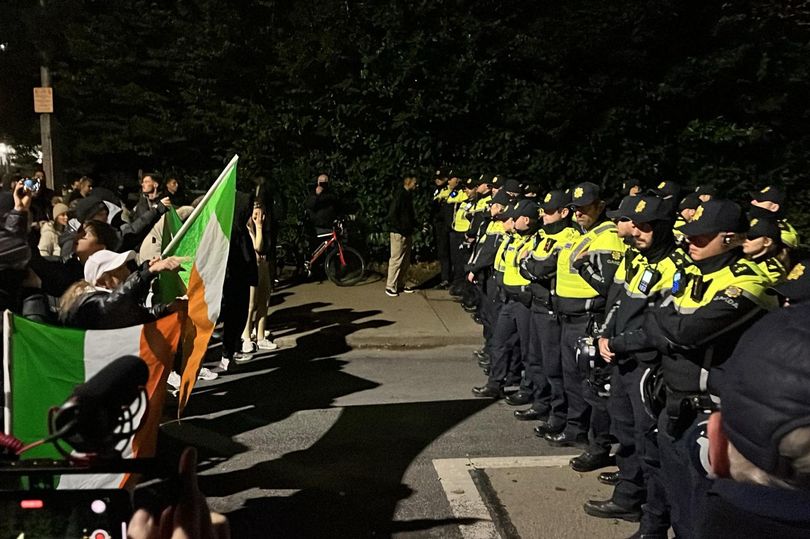 Two Gardaí hospitalised, one with head injury, and 23 people arrested ...