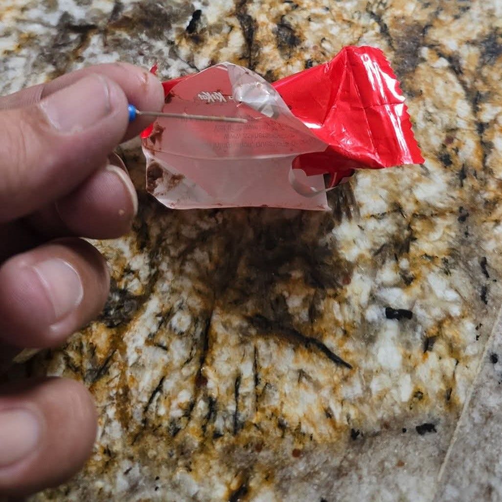 Families find sewing pins in candy distributed at Texas parade