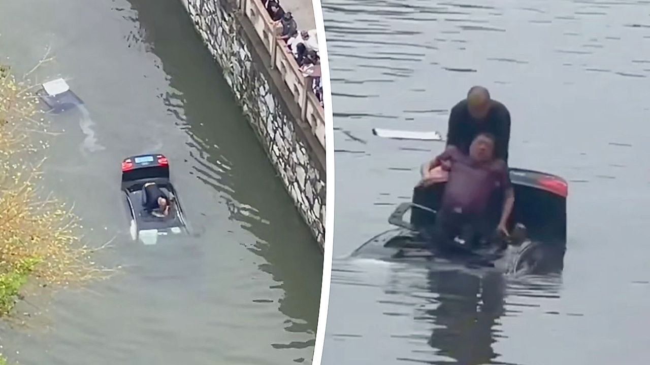 Heroic man dives into river to rescue driver trapped in submerged car