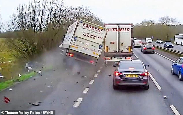 Moment lorry ploughs into layby and hits two parked cars - as woman, 35 ...