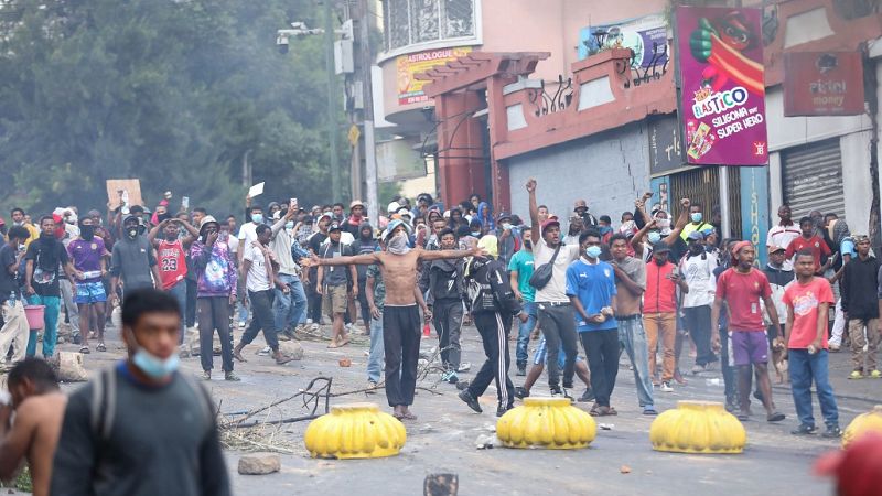 Demonstrators protesting against chronic electricity and water cuts confront riot police in Antananarivo, Madagascar, Tuesday, Sept. 30, 2025.