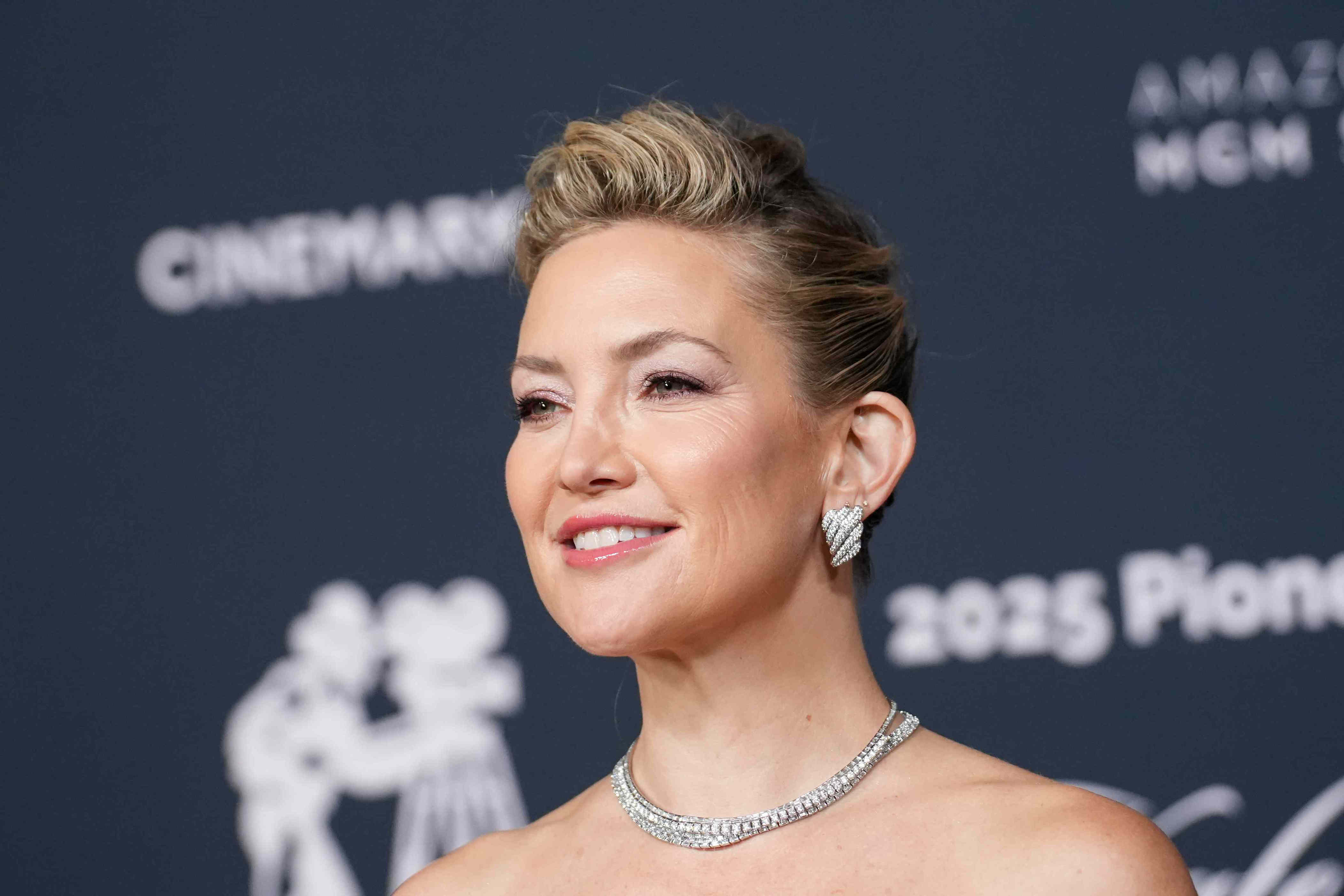 Kate Hudson Turns Heads in a Liquid, Optical Illusion Dress for Rare