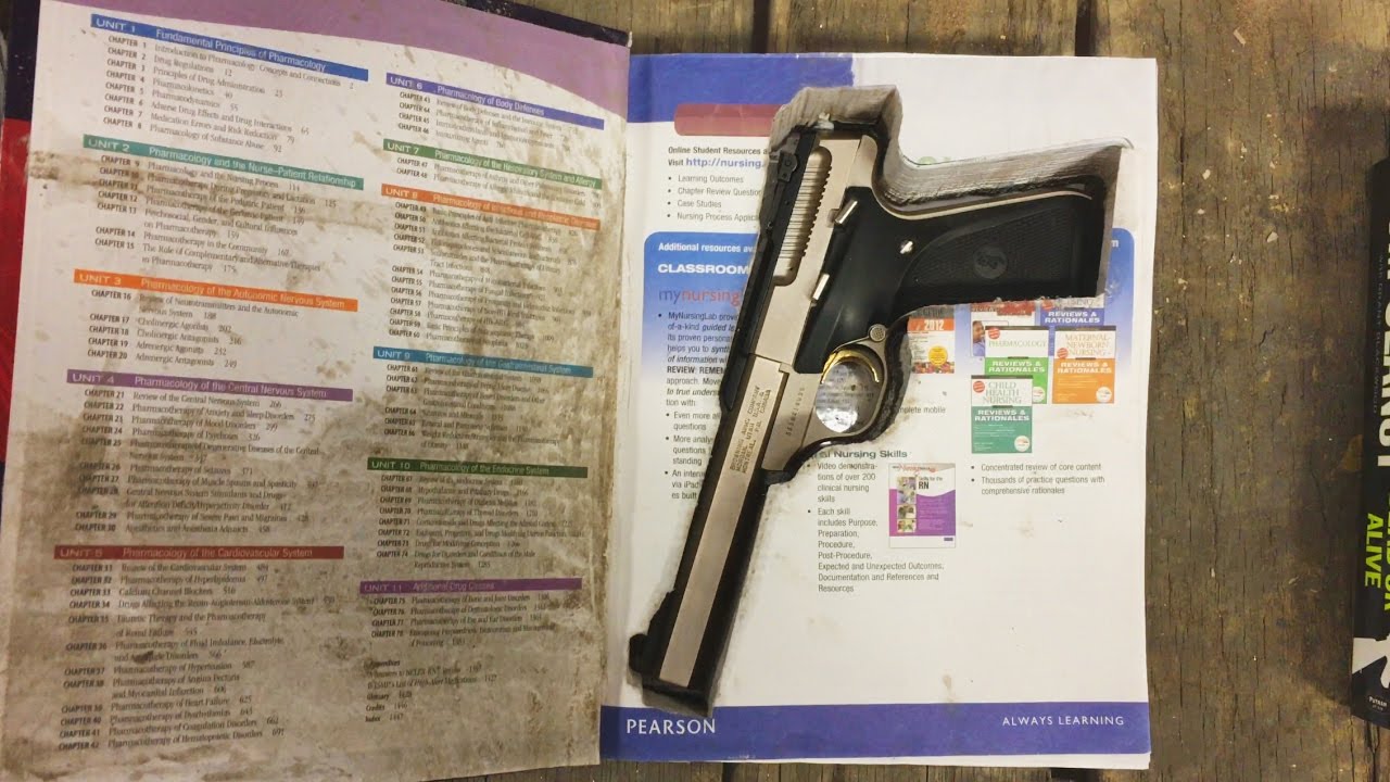 Hidden gun in hollow book