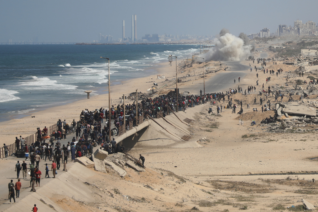 The Latest: Tens of thousands of Palestinians in Gaza return north as ...