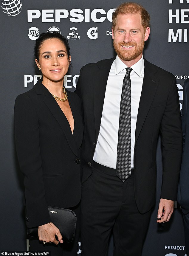 Meghan Markle, 44, shared a telling exchange with husband Prince Harry, 41, after their 'awkward' red carpet appearance in NYC one day earlier (seen above)