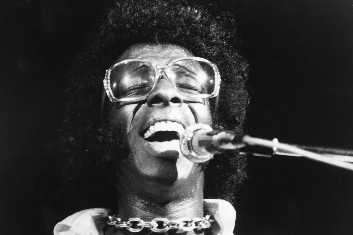 Musician Sly Stone of the psychedelic soul group Sly and the Family Stone performs at the Woodstock Festival in Bethel, N.Y., on Aug. 17, 1969.