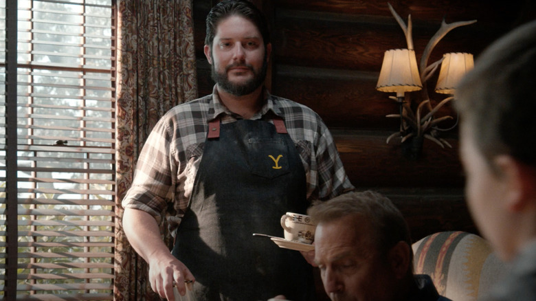 Chef Gator holding a cup on Yellowstone