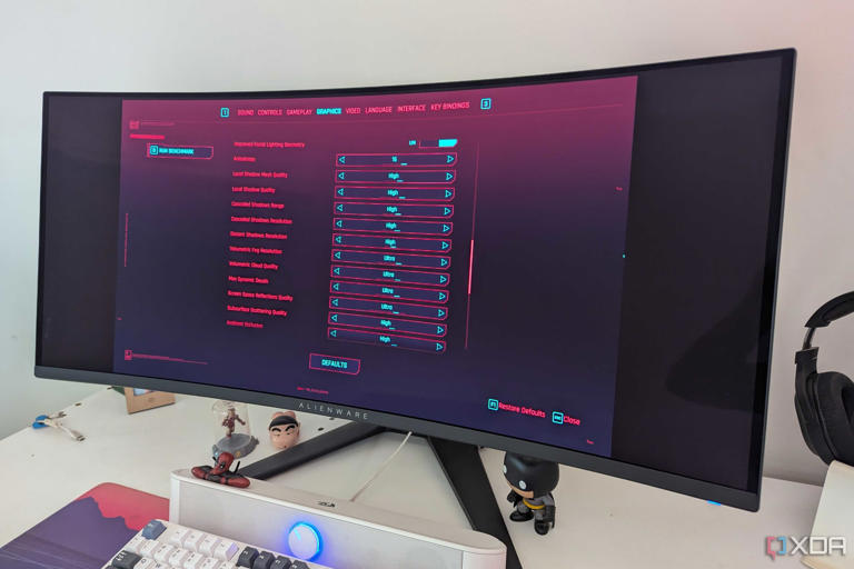 An ultrawide monitor showing the graphics settings of Cyberpunk 2077