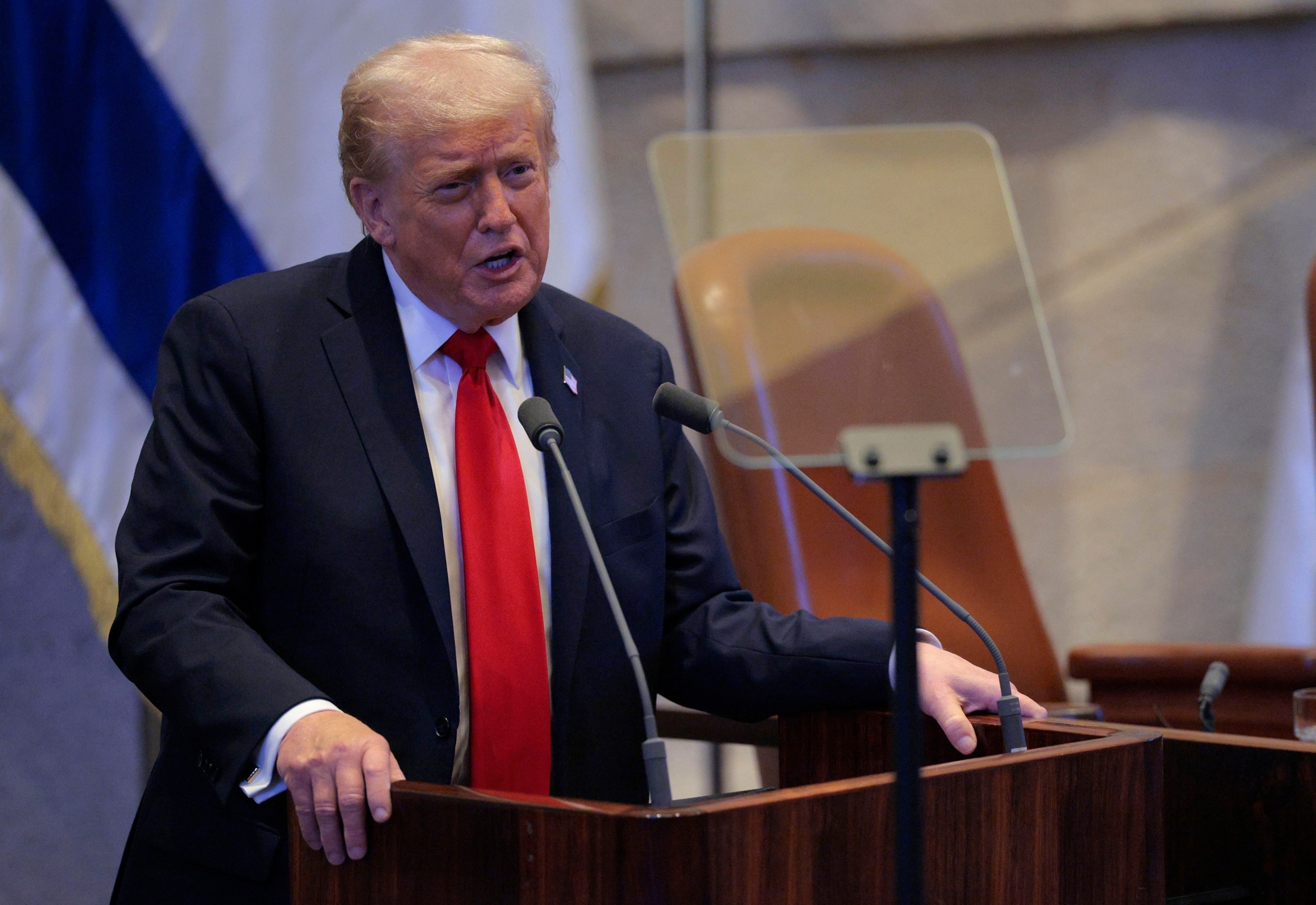 Chip Somodevilla/Getty Images - PHOTO: President Donald Trump addresses the Knesset, Israel's parliament, October 13, 2025 in Jerusalem.