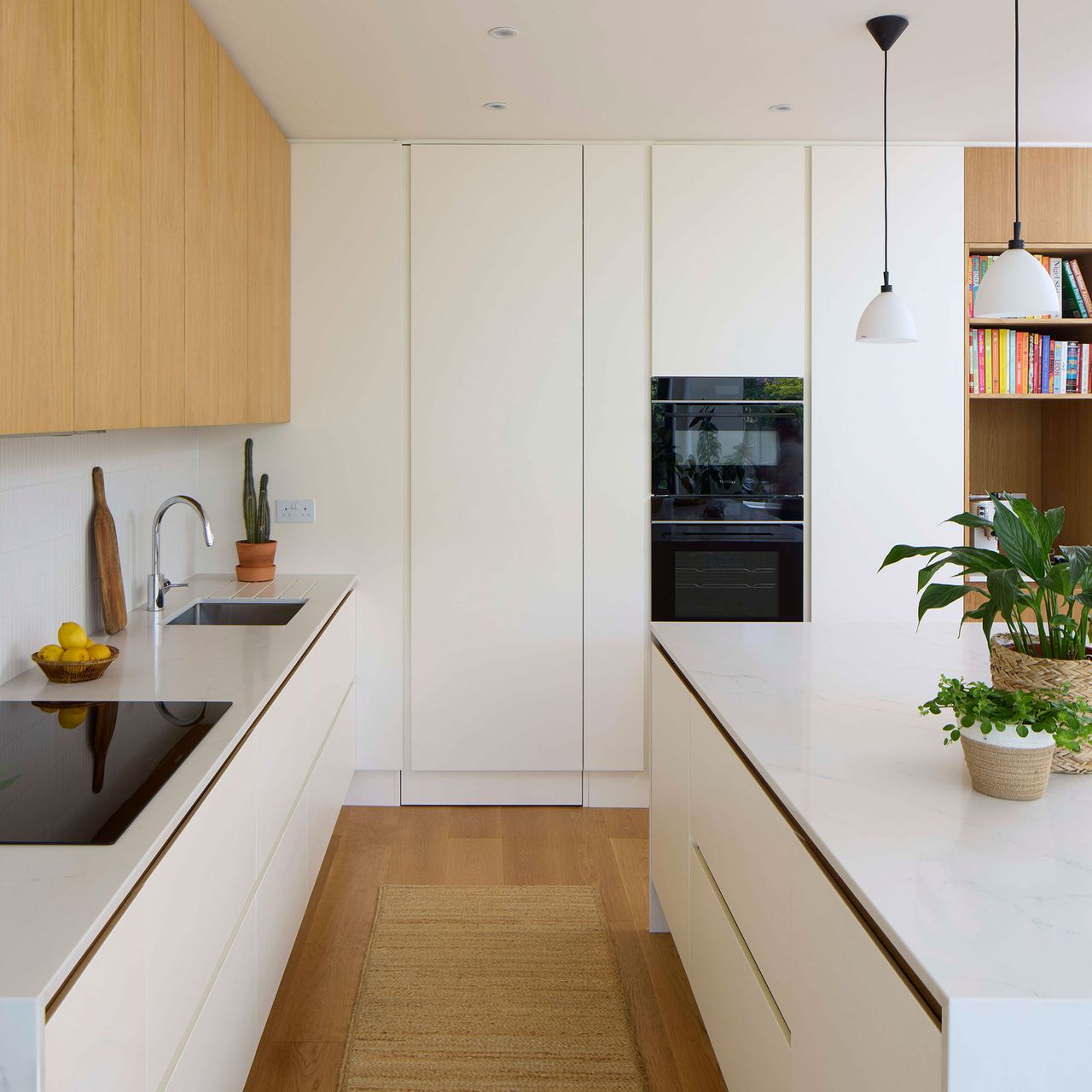 This kitchen became a clean-lined, clutter-free space full of hidden ...