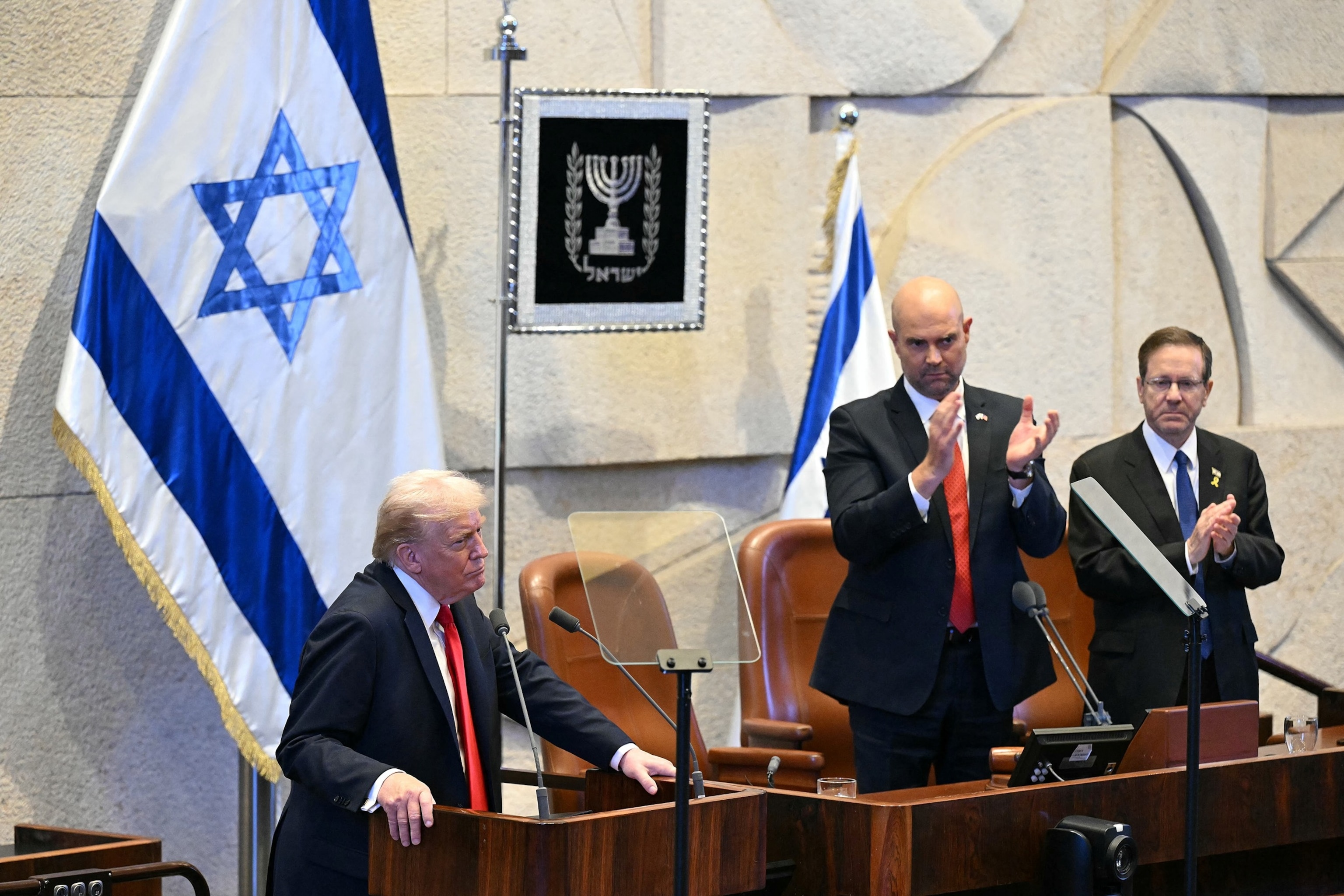 Saul Loeb/Pool/AFP via Getty Images - PHOTO: President Donald Trump addresses the Israeli parliament, the Knesset, in Jerusalem, October 13, 2025.