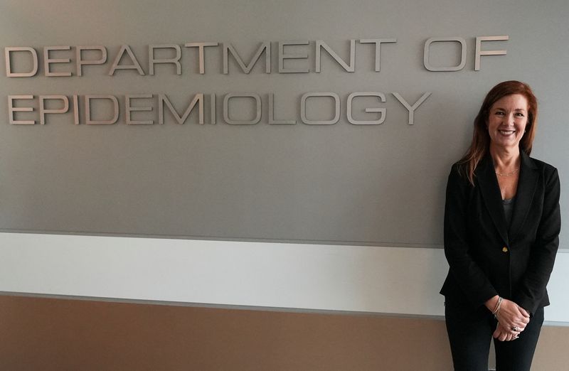 Jodie Guest stands outside the Department of Epidemiology at Emory University in Atlanta