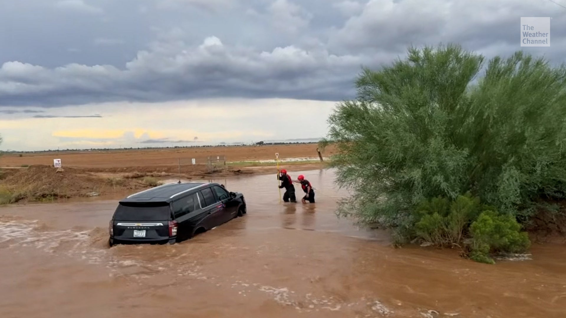 See Daring Rescues Of Drivers Trapped In Arizona Flash Floods