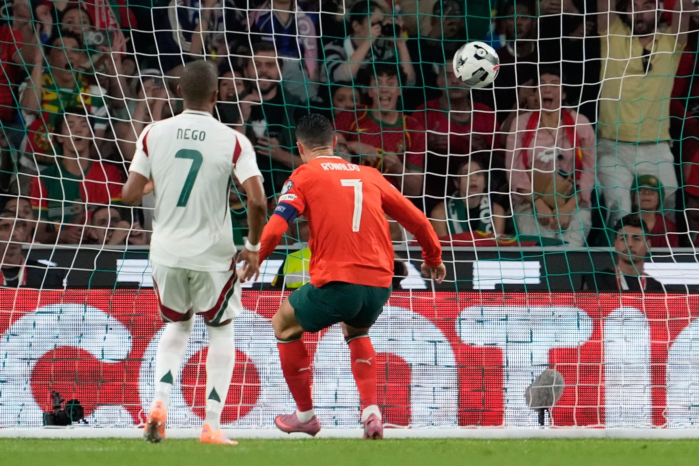 Portugal's Cristiano Ronaldo,scores during a World Cup 2026 group F qualifying soccer match between Portugal and Hungary in Lisbon, Tuesday, Oct. 14, 2025. (AP Photo/Armando Franca)