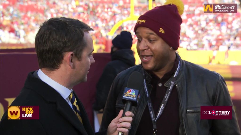 Craig Melvin at a Commanders game
