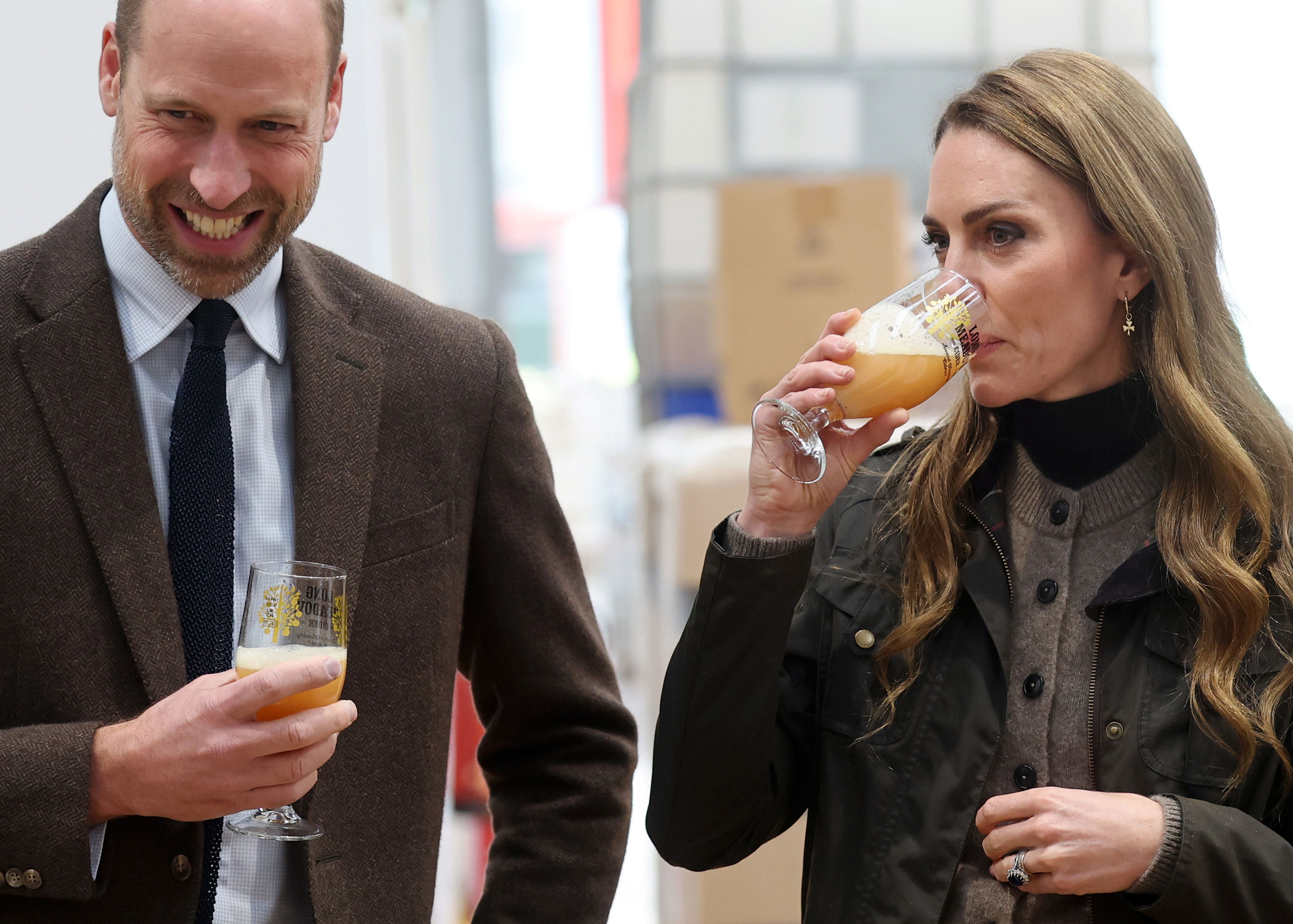 Prince William and Kate ride in a fire engine and pick apples during ...
