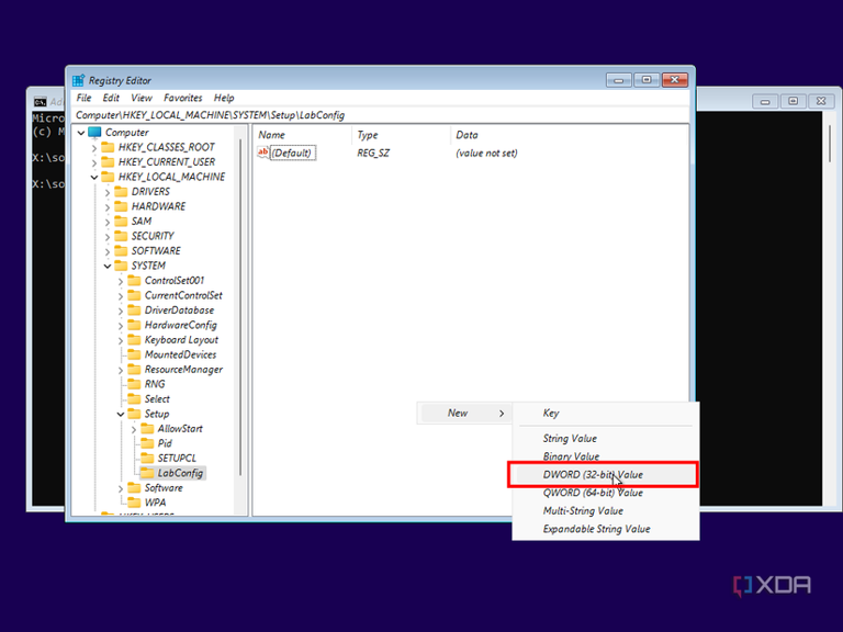 Screenshot of Registry Editor during Windows 11 setup with the option to create a new value highlighted