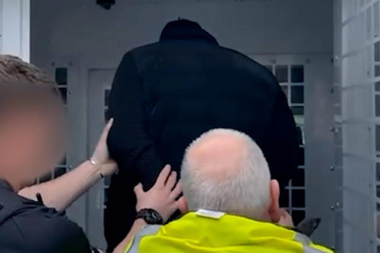 Notorious people smuggler caught after migrant-filled yacht runs aground