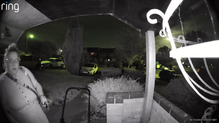 Video grab of the moment mum Paige Cox realised she’d made it to her front door without her baby in the pram. (Pix via SWNS)