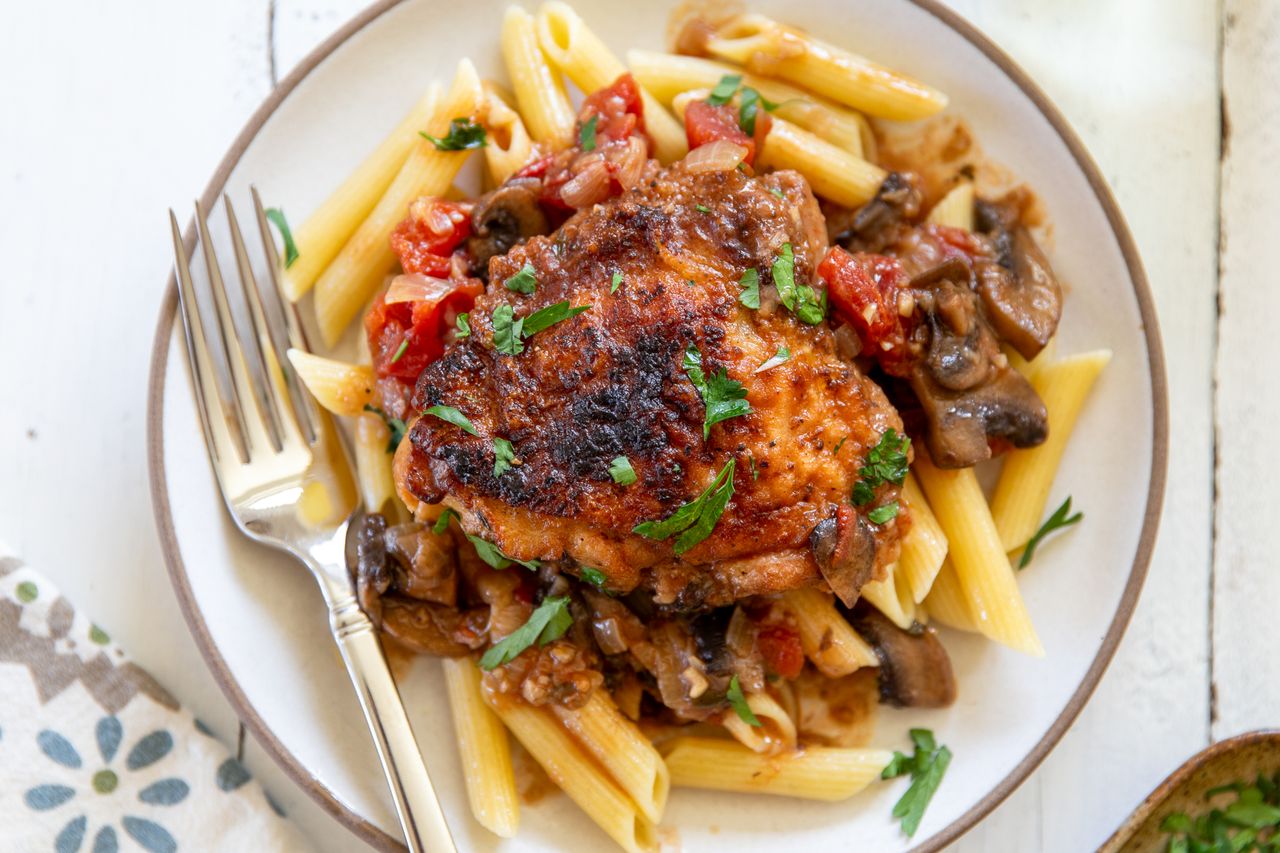 chicken marengo served over pasta