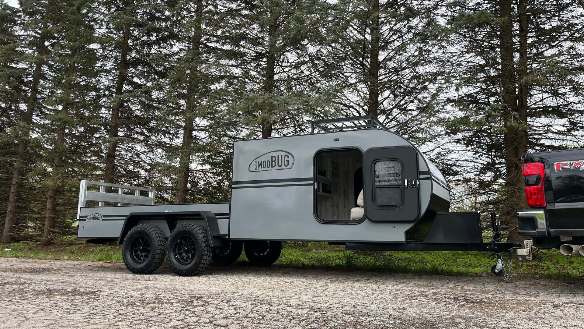 Finally, a Motorcycle Trailer That Also Has a Camper Built In