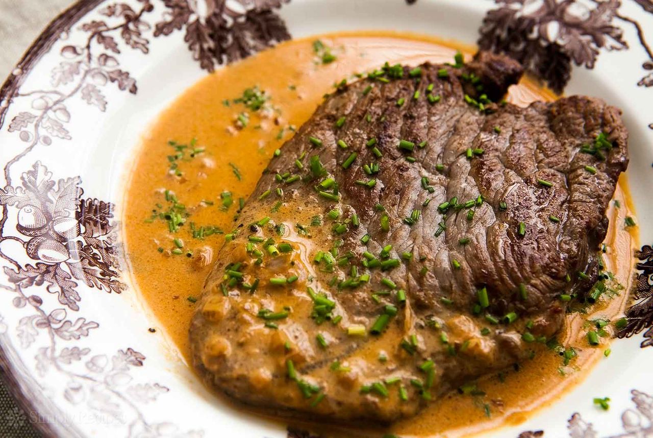 A plate of Steak Diane, ready to serve