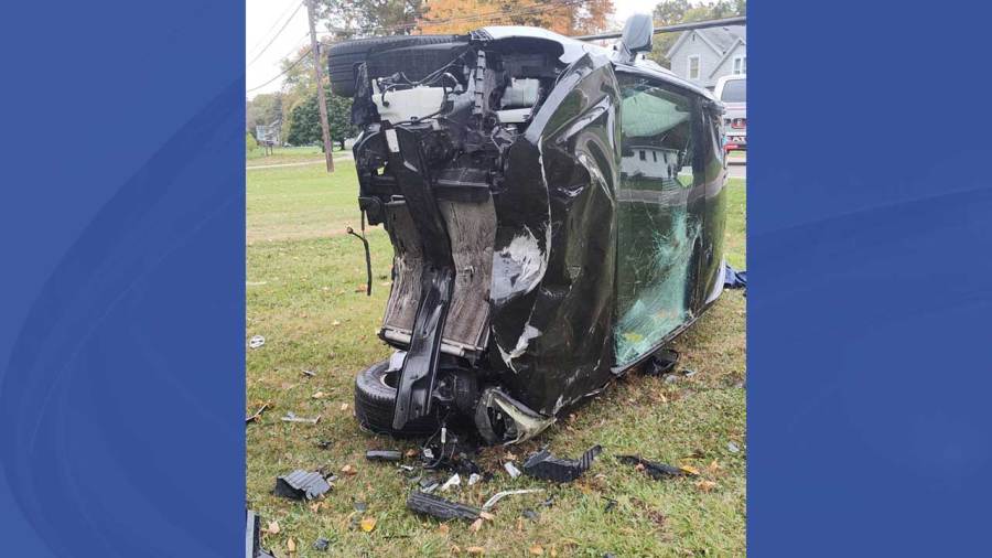Road reopened after rollover crash takes down telephone pole, wires