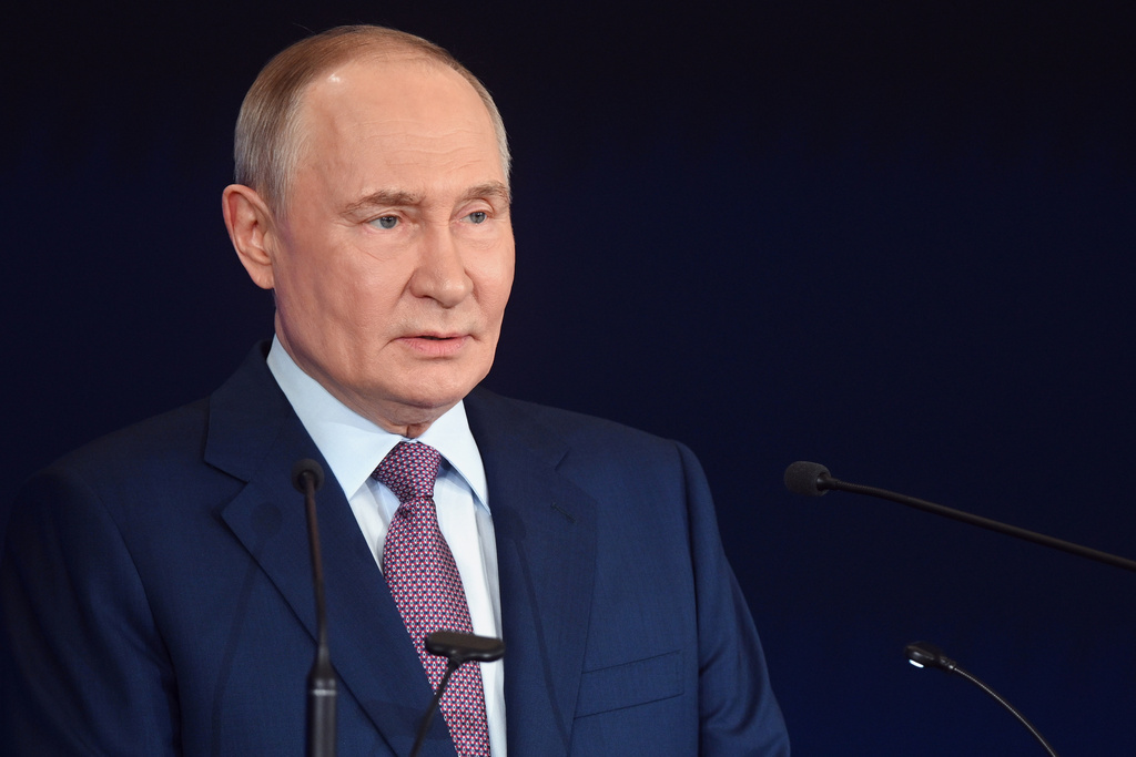 Putin deplores US sanctions as 'unfriendly' while EU joins in heaping ...