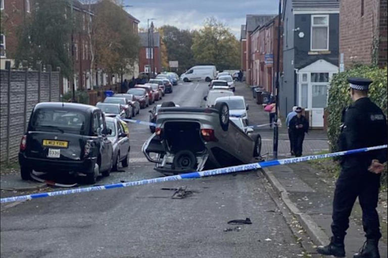 Car pictured on its roof as man stabbed to death after crash in ...
