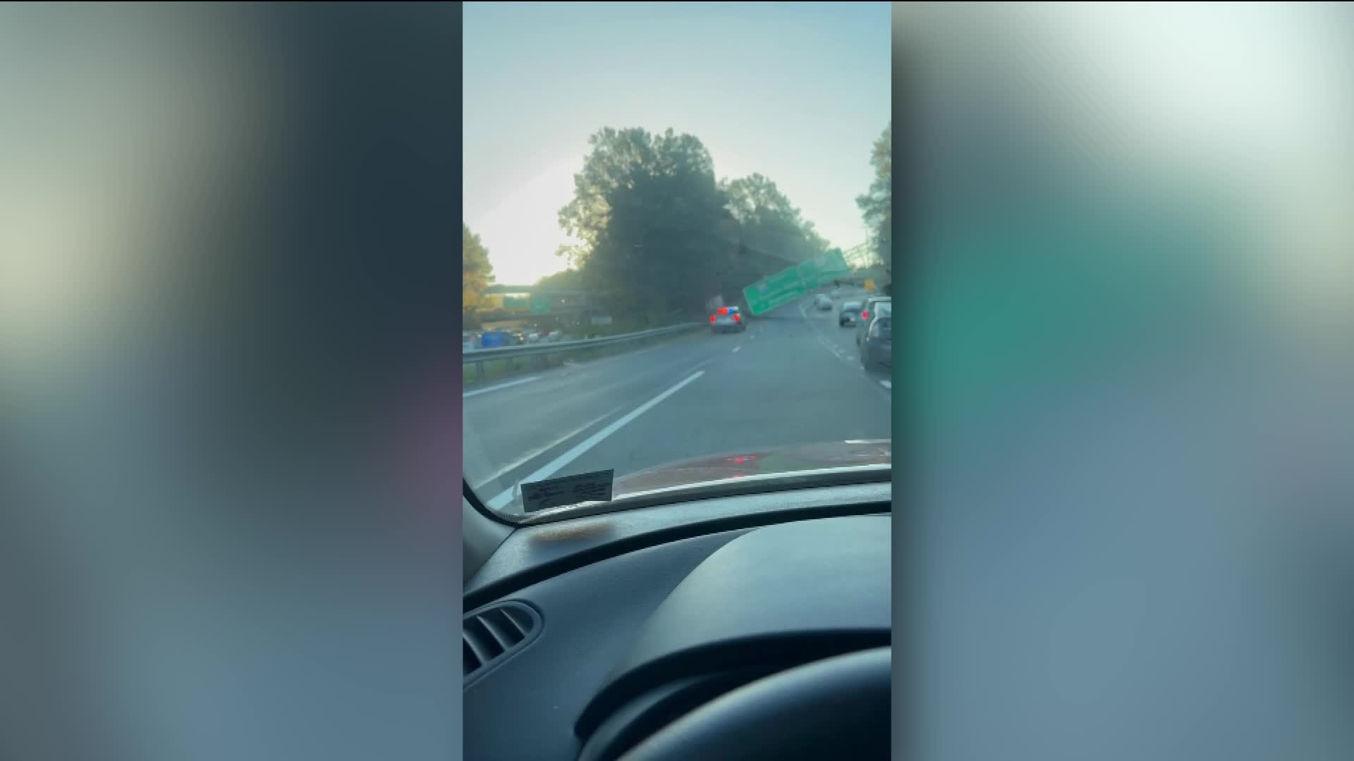 Semi wreck snarls traffic on I-64, downs sign on busy exit ramp to Richmond