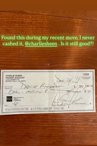 Denise Richards Charlie Sheen check