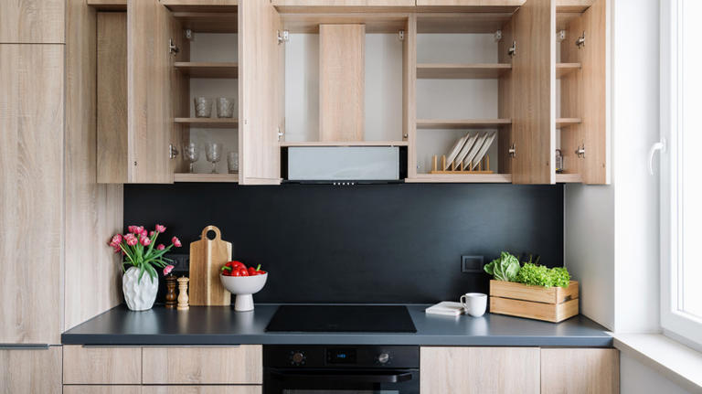 The Dollar Tree Kitchen Hack That Adds Hidden Storage Inside Cabinet Doors