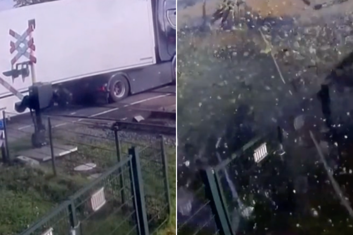 High-speed train smashes through lorry stuck on level crossing